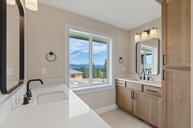 16931 E 16th Ln, Spokane Valley, WA 99037 - full bath featuring a mountain view, plenty of natural light, and vanity