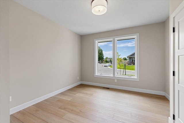 16931 E 16th Ln, Spokane Valley, WA 99037 - spare room with light wood finished floors and baseboards