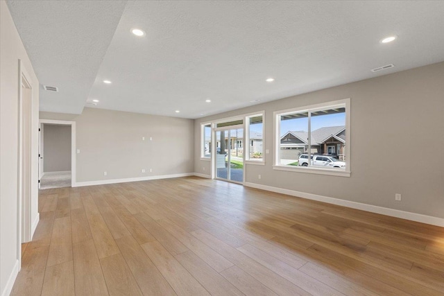 16931 E 16th Ln, Spokane Valley, WA 99037 - unfurnished room featuring light wood finished floors, recessed lighting, and a textured ceiling