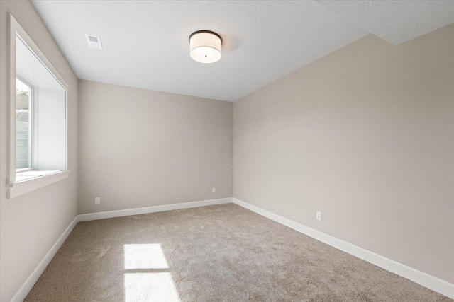 16931 E 16th Ln, Spokane Valley, WA 99037 - empty room featuring carpet floors and baseboards