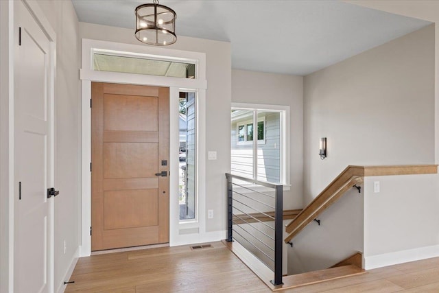 16931 E 16th Ln, Spokane Valley, WA 99037 - entrance foyer with light wood-style floors and a chandelier