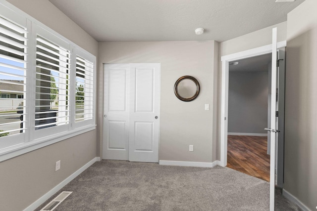 2373 N Colonial Rd, Liberty Lake, WA 99016 - unfurnished bedroom with carpet flooring and baseboards