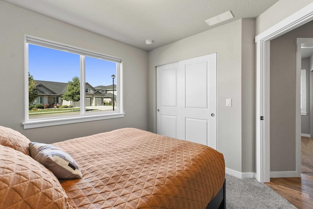 2373 N Colonial Rd, Liberty Lake, WA 99016 - bedroom with a closet and wood finished floors