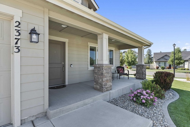 2373 N Colonial Rd, Liberty Lake, WA 99016 - doorway to property featuring covered porch