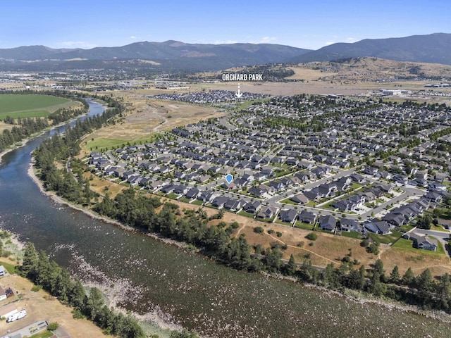 2373 N Colonial Rd, Liberty Lake, WA 99016 - aerial overview of property's location with a water and mountain view and nearby suburban area