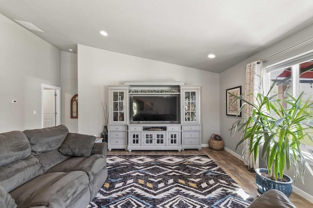 2373 N Colonial Rd, Liberty Lake, WA 99016 - living room with lofted ceiling, wood finished floors, and recessed lighting