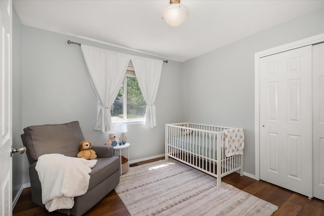 5916 S Division St, Spokane, WA 99224 - bedroom with wood finished floors and a crib