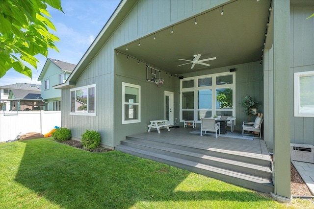 5916 S Division St, Spokane, WA 99224 - back of property with ceiling fan and a deck