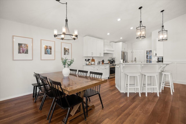 5916 S Division St, Spokane, WA 99224 - dining area featuring a chandelier, recessed lighting, and dark wood-type flooring