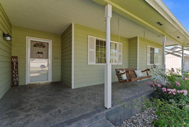 17813 N Lidgerwood St, Colbert, WA 99005 - property entrance with a porch