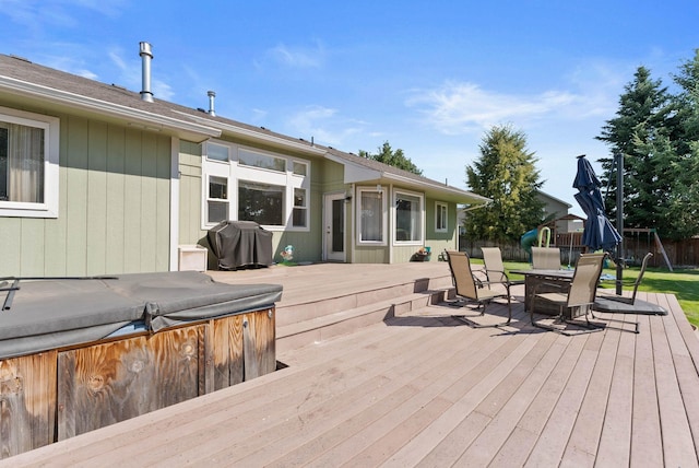 17813 N Lidgerwood St, Colbert, WA 99005 - deck with grilling area, a hot tub, and outdoor dining area