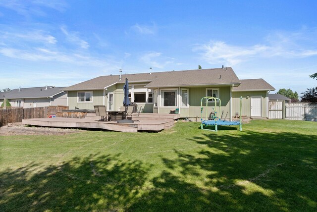 17813 N Lidgerwood St, Colbert, WA 99005 - back of property with a fenced backyard and a wooden deck