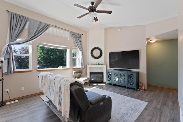 17813 N Lidgerwood St, Colbert, WA 99005 - living room featuring wood finished floors, ceiling fan, and a glass covered fireplace