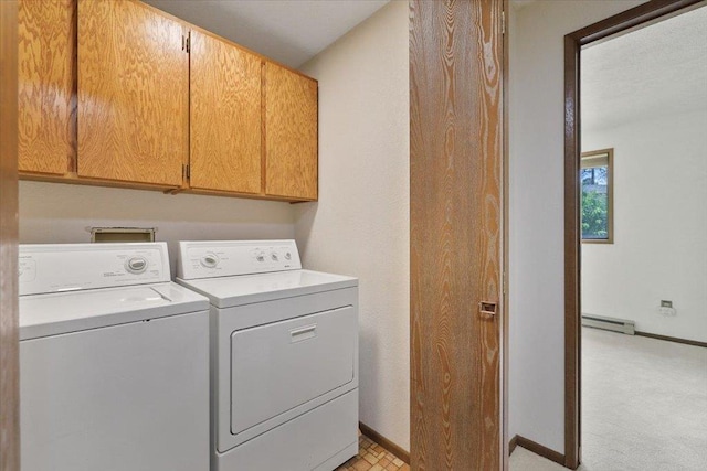 417 Clay St Unit A, Cheney, WA 99004 - laundry room featuring cabinet space, a baseboard heating unit, washing machine and dryer, and light carpet