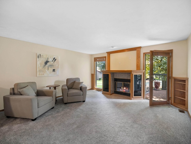 3808 S Alder Dr, Spokane, WA 99223 - living room with carpet floors and a fireplace with flush hearth