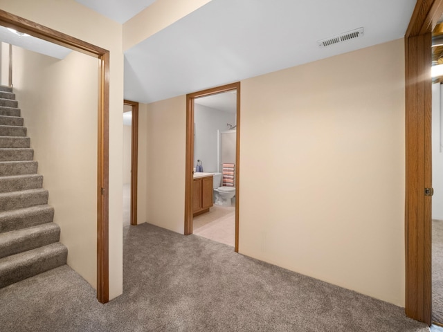 3808 S Alder Dr, Spokane, WA 99223 - finished below grade area with light carpet and stairway