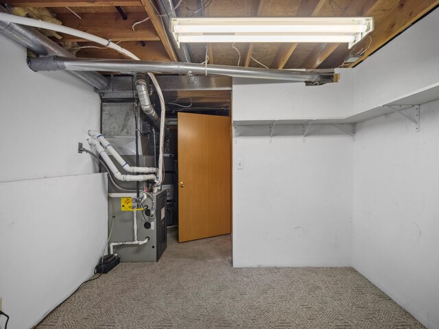 3808 S Alder Dr, Spokane, WA 99223 - unfinished basement with carpet and heating unit