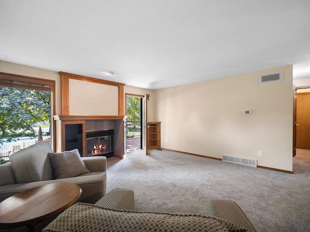 3808 S Alder Dr, Spokane, WA 99223 - carpeted living room with a glass covered fireplace and baseboards