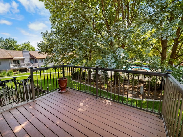 3808 S Alder Dr, Spokane, WA 99223 - wooden terrace featuring a lawn and a pool