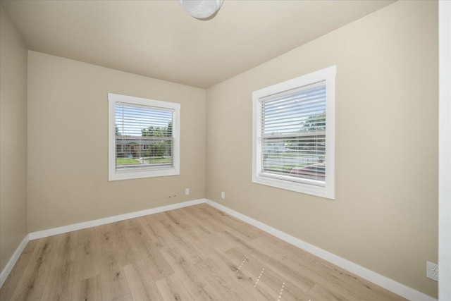 2323 E Rich Ave, Spokane, WA 99207 - empty room featuring light wood finished floors and baseboards
