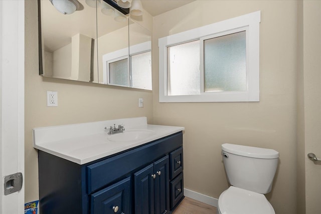 2323 E Rich Ave, Spokane, WA 99207 - bathroom featuring vanity and wood finished floors