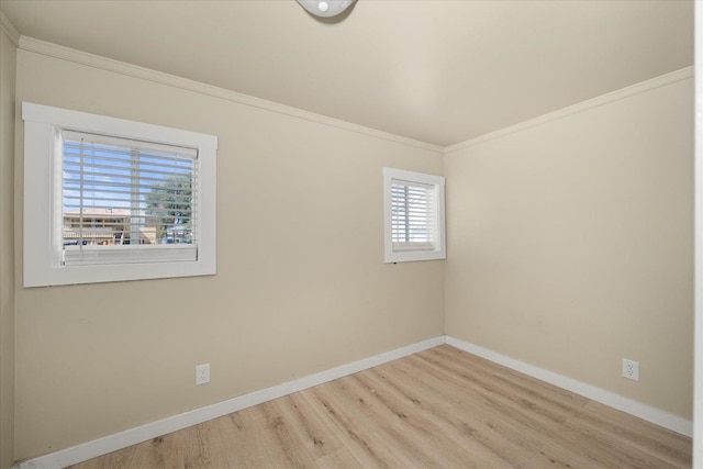 2323 E Rich Ave, Spokane, WA 99207 - spare room featuring ornamental molding and wood finished floors