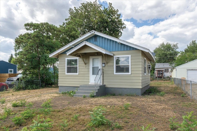 2323 E Rich Ave, Spokane, WA 99207 - bungalow-style home featuring board and batten siding and entry steps