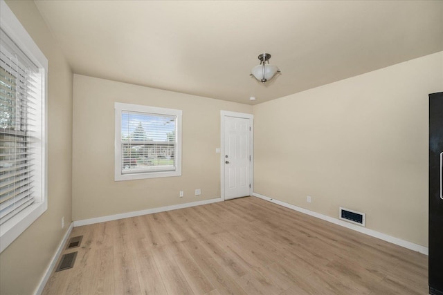 2323 E Rich Ave, Spokane, WA 99207 - empty room featuring light wood-style flooring and baseboards