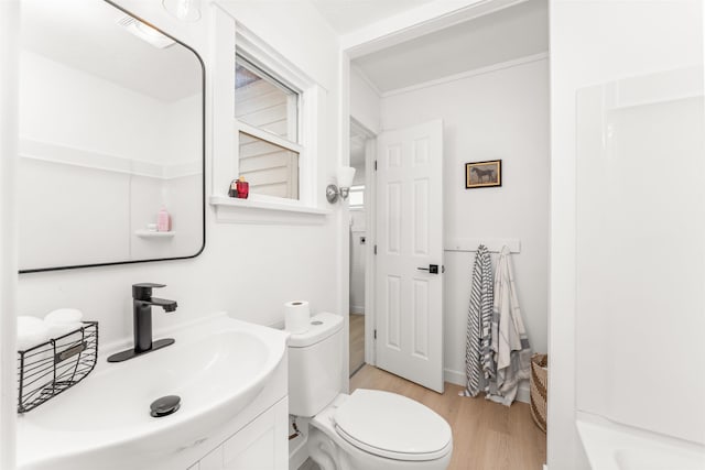 1227 E Providence Ave, Spokane, WA 99207 - full bathroom with wood finished floors and vanity
