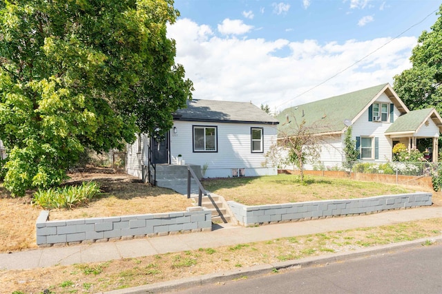 1227 E Providence Ave, Spokane, WA 99207 - bungalow with a front yard and roof with shingles