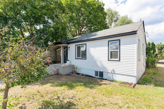1227 E Providence Ave, Spokane, WA 99207 - view of front facade with a front lawn and roof with shingles