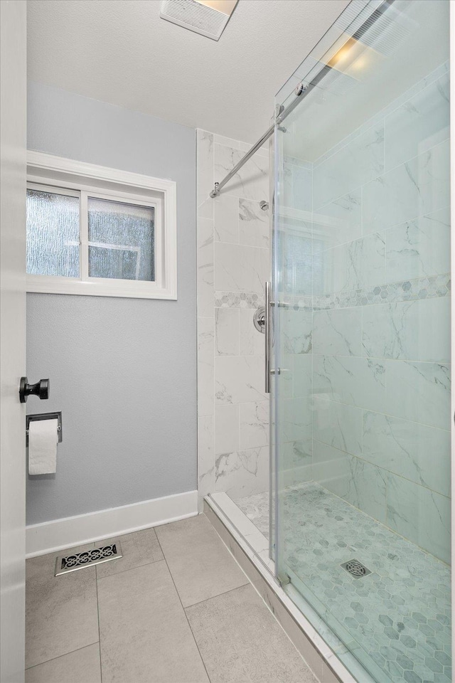 8024 E Elde Dr, Spokane, WA 99212 - full bathroom featuring a stall shower and tile patterned flooring