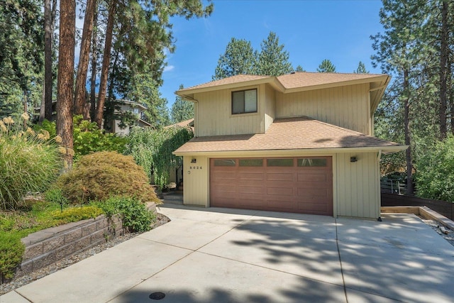 8024 E Elde Dr, Spokane, WA 99212 - view of front of home featuring a shingled roof, driveway, and an attached garage