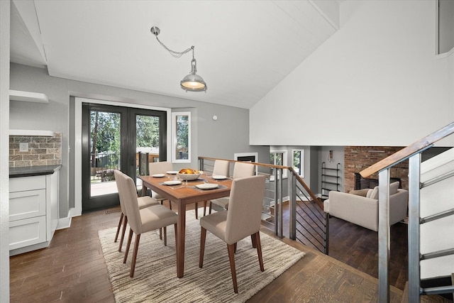 8024 E Elde Dr, Spokane, WA 99212 - dining room featuring a fireplace, dark wood finished floors, french doors, and high vaulted ceiling