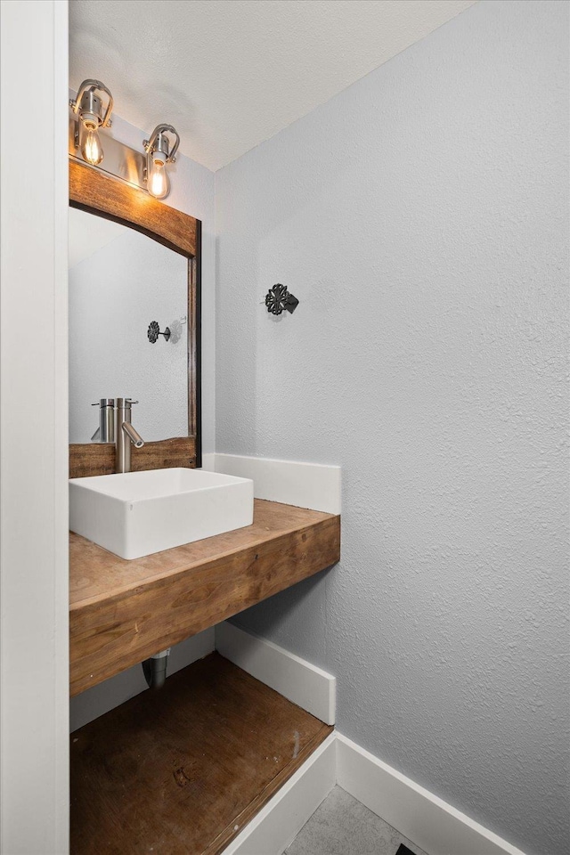 8024 E Elde Dr, Spokane, WA 99212 - bathroom with a sink and a textured wall