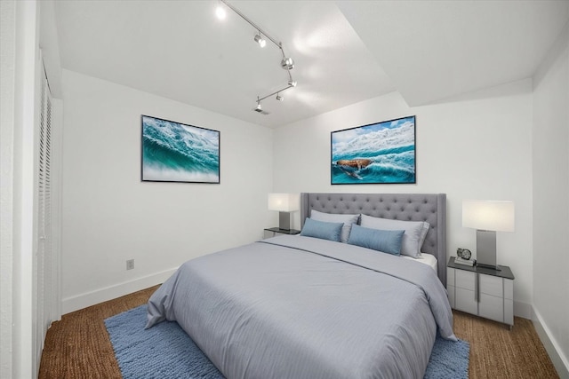 8024 E Elde Dr, Spokane, WA 99212 - carpeted bedroom with baseboards and rail lighting