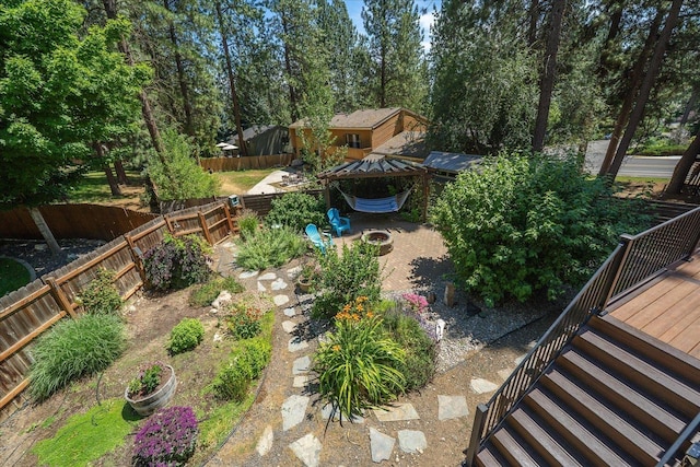 8024 E Elde Dr, Spokane, WA 99212 - fenced backyard featuring a wooden deck and stairs