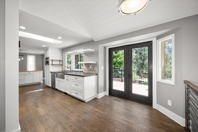8024 E Elde Dr, Spokane, WA 99212 - kitchen featuring french doors, open shelves, stainless steel dishwasher, white cabinets, and recessed lighting