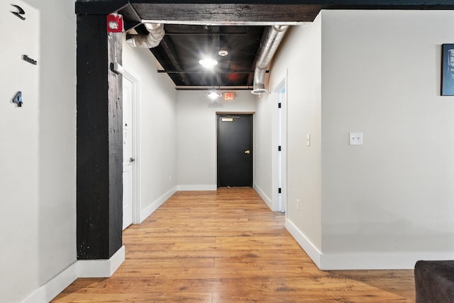 315 W Riverside Ave Unit 101, Spokane, WA 99201 - hallway featuring light wood finished floors and baseboards