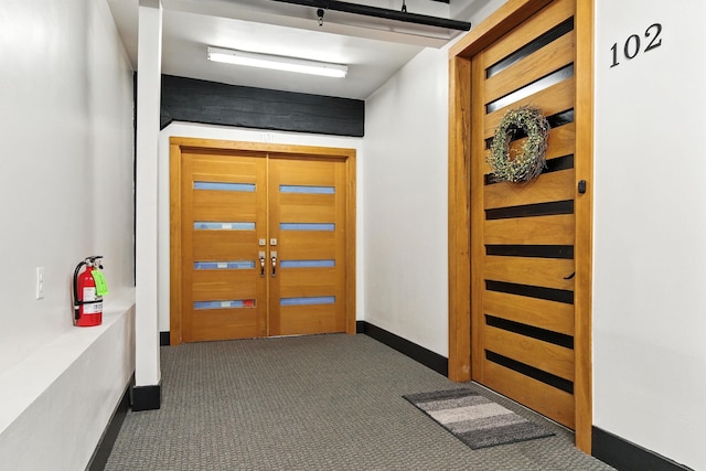 315 W Riverside Ave Unit 101, Spokane, WA 99201 - hall with carpet flooring and baseboards