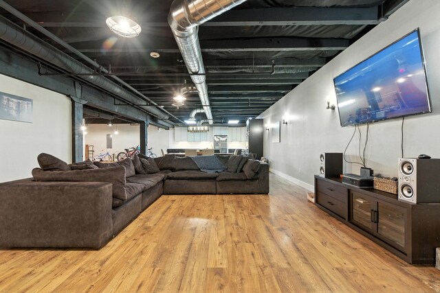 315 W Riverside Ave Unit 101, Spokane, WA 99201 - living room with wood finished floors and baseboards