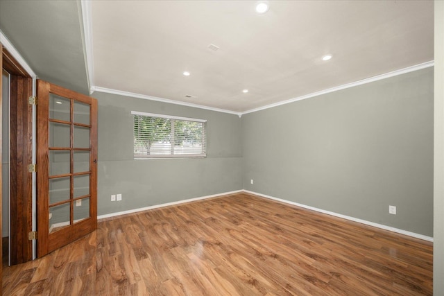 10002 W Richland Rd, Cheney, WA 99004 - empty room featuring crown molding, wood finished floors, and recessed lighting