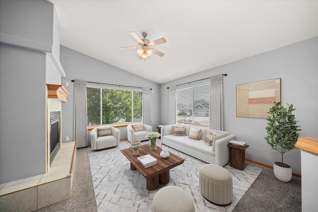 10002 W Richland Rd, Cheney, WA 99004 - living room with lofted ceiling, a ceiling fan, light colored carpet, and a glass covered fireplace