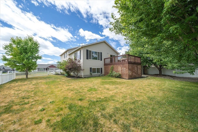 10002 W Richland Rd, Cheney, WA 99004 - rear view of house with a fenced backyard and a wooden deck