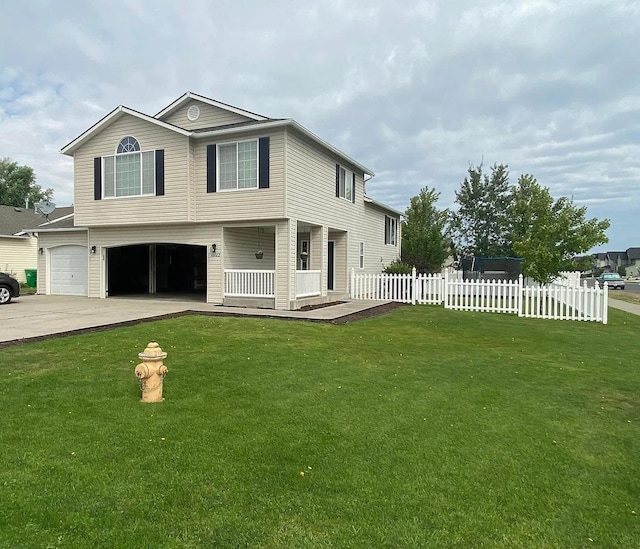 10002 W Richland Rd, Cheney, WA 99004 - view of front facade with a garage, driveway, and a porch