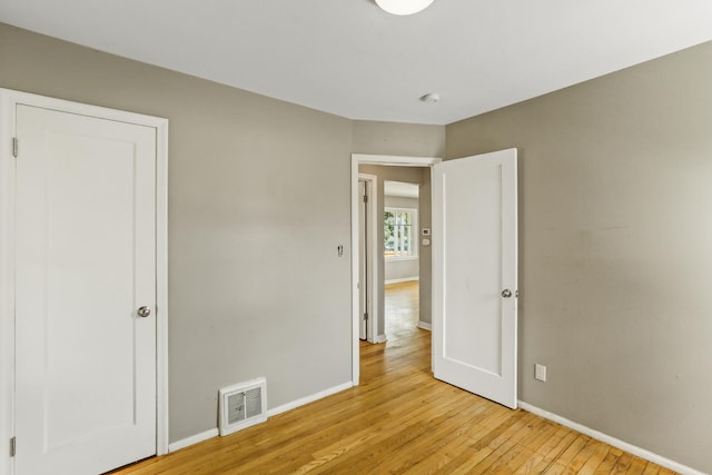 3608 E Fairview Ave, Spokane, WA 99217 - unfurnished bedroom featuring baseboards and light wood-style floors