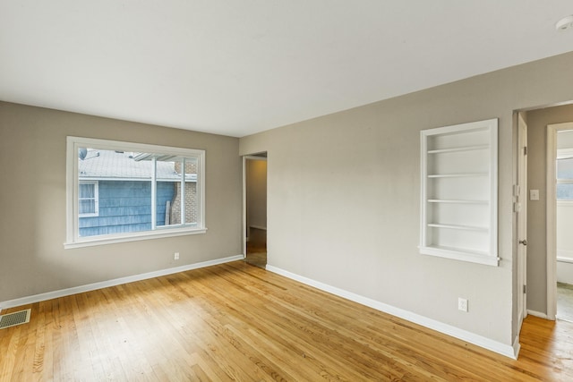 3608 E Fairview Ave, Spokane, WA 99217 - spare room featuring light wood-type flooring and built in features