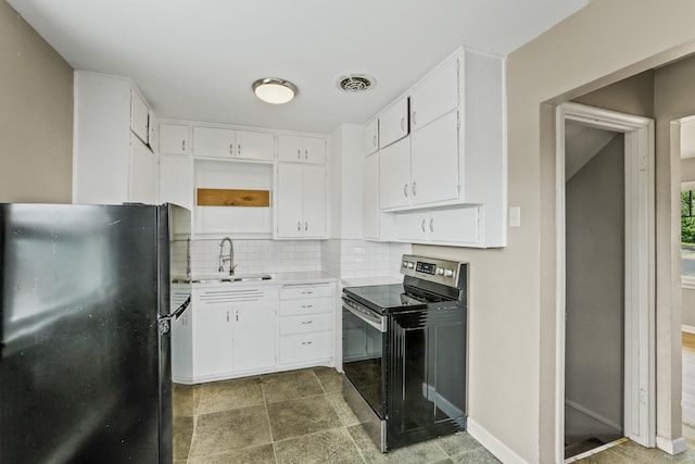 3608 E Fairview Ave, Spokane, WA 99217 - kitchen featuring freestanding refrigerator, electric range, backsplash, light countertops, and white cabinetry