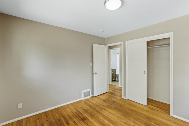 3608 E Fairview Ave, Spokane, WA 99217 - unfurnished bedroom with light wood-style flooring and a closet
