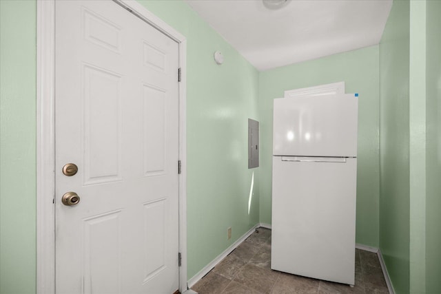 2608 E Heroy Ave, Spokane, WA 99207 - kitchen with freestanding refrigerator and electric panel